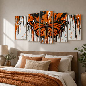 A 5-panel canvas wall art set featuring a stylized orange and black butterfly with dripping paint effects, displayed above a bed in a modern bedroom setting.