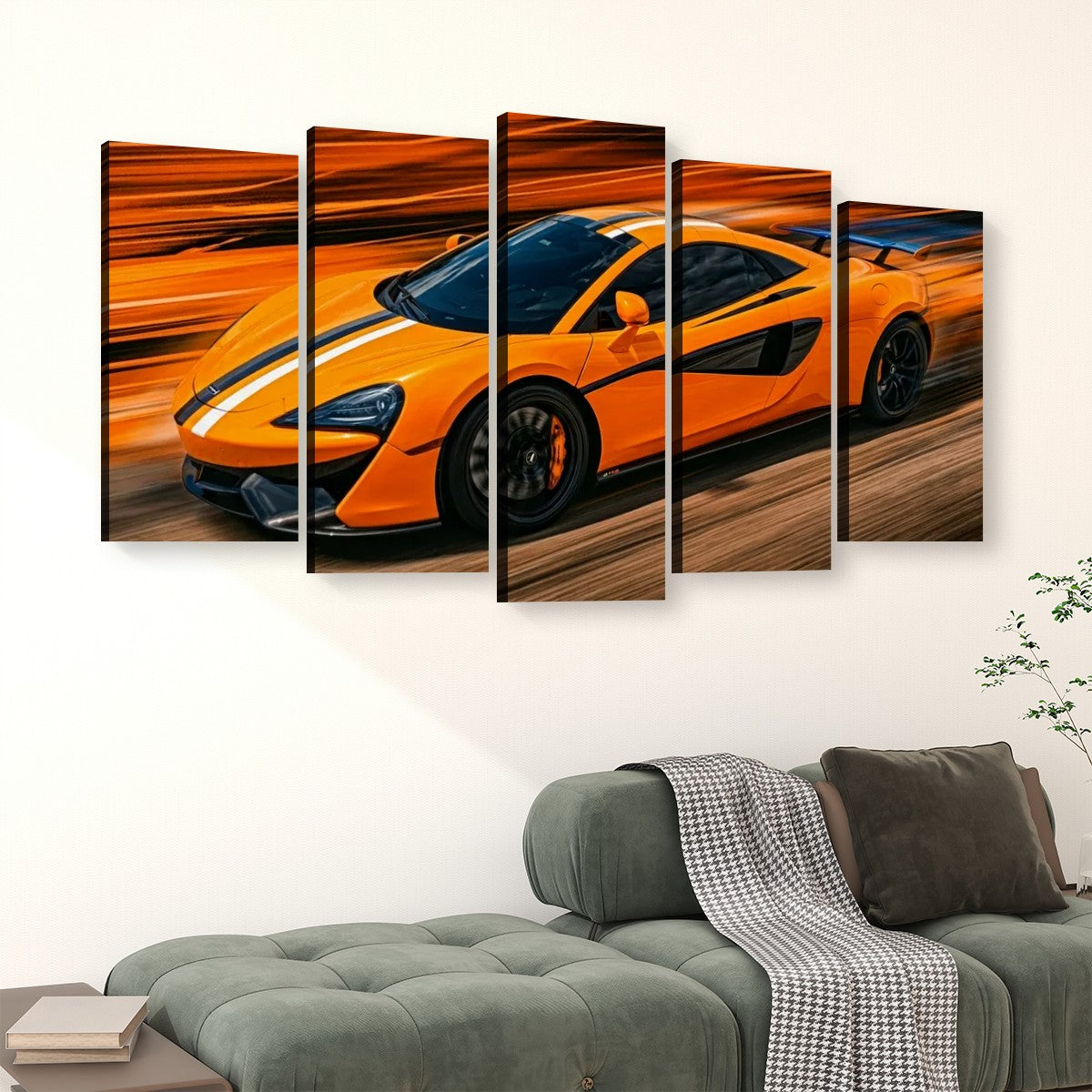 A five-panel canvas wall art set depicting a bright orange sports car with black racing stripes on a blurred orange and brown background, displayed above a green sofa in a living room setting.