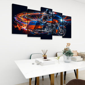 A 5-panel canvas wall art set depicting a Road Glide type motorcycle with vibrant orange and blue light trails on a black background, displayed on a white wall above a modern dining table.