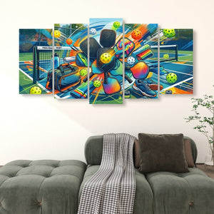 A 5-panel canvas wall art set depicting a colorful, dynamic illustration of a pickleball player in a black uniform throwing a yellow pickleball court, shown hanging on a white wall above a green sofa.