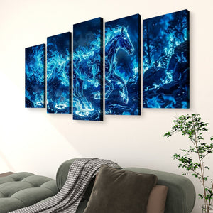 A 5-panel canvas wall art set depicting a glowing blue horse against a dark cosmic background, displayed on a beige wall above a green sofa with a plant nearby.