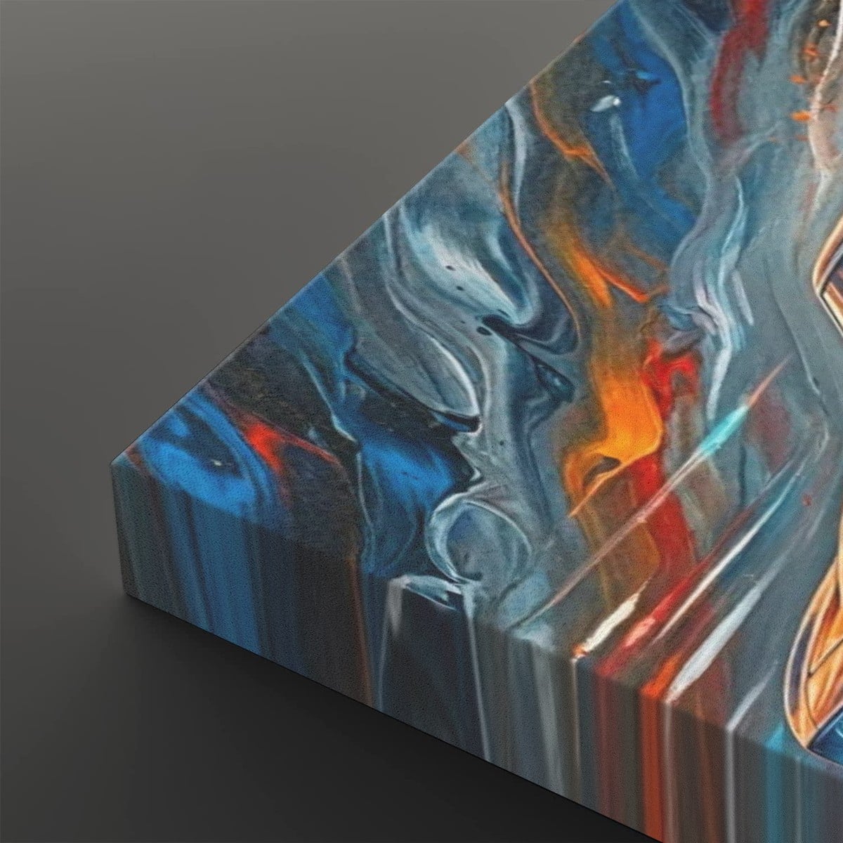 Abstract canvas wall art showing a close-up of a triangular canvas corner with swirling blue, white, gray, orange, and red paint details on a dark gray background.