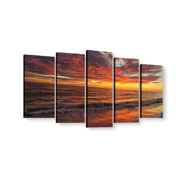 A five-panel canvas wall art set depicting a dramatic Indian Rocks Beach, FL Sunset with glowing orange and red clouds, dark water, and reflective shoreline, shown against a plain white background.
