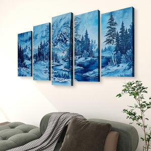 A five-panel canvas wall art set depicting a snowy blue winter landscape with trees and a river, displayed above a green sofa in a living room setting.