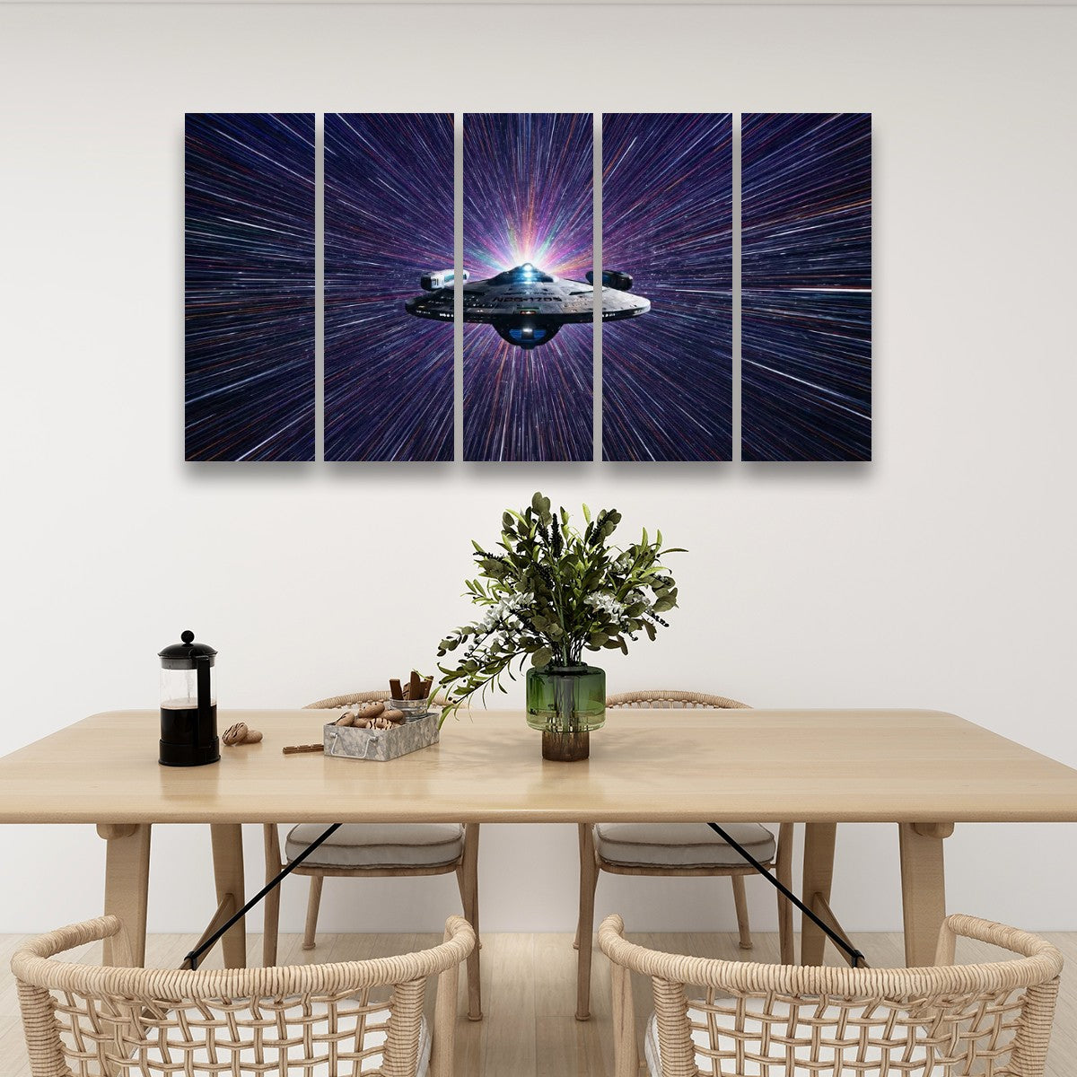 A five-panel canvas wall art set depicting the Star Wars Millennium Falcon in a purple and blue starburst space scene, displayed on a white wall above a wooden dining table with chairs.