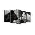 Five-panel canvas wall art showing a black wolf and a white wolf facing each other, with red eyes, on a white background.