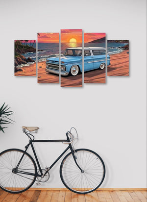 Wall art of a blue station wagon on a beach with a bicycle in front