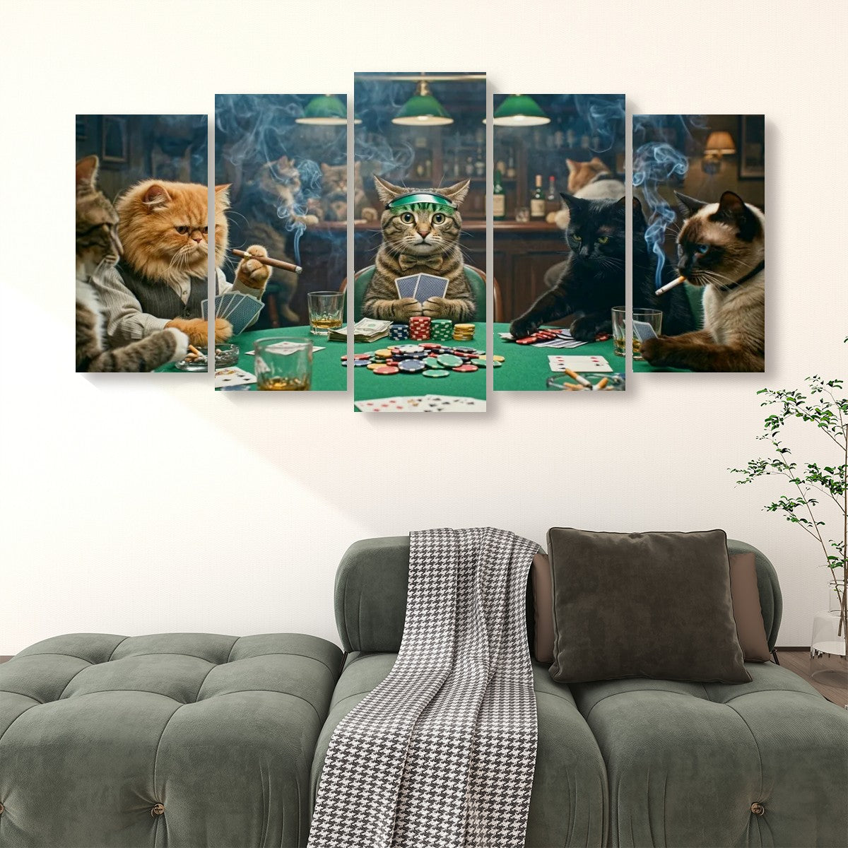 A 5-panel canvas wall art set depicting cats playing poker at a green table, shown hanging on a white wall above a gray sofa in a living room setting.