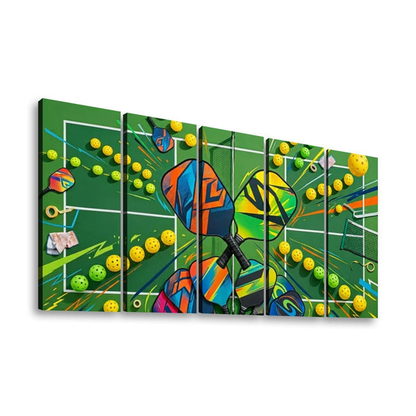 A multi-panel canvas wall art print depicting a colorful pickleball court scene with bright green court background, yellow and green balls, and stylized multicolored paddles, shown against a plain white background.