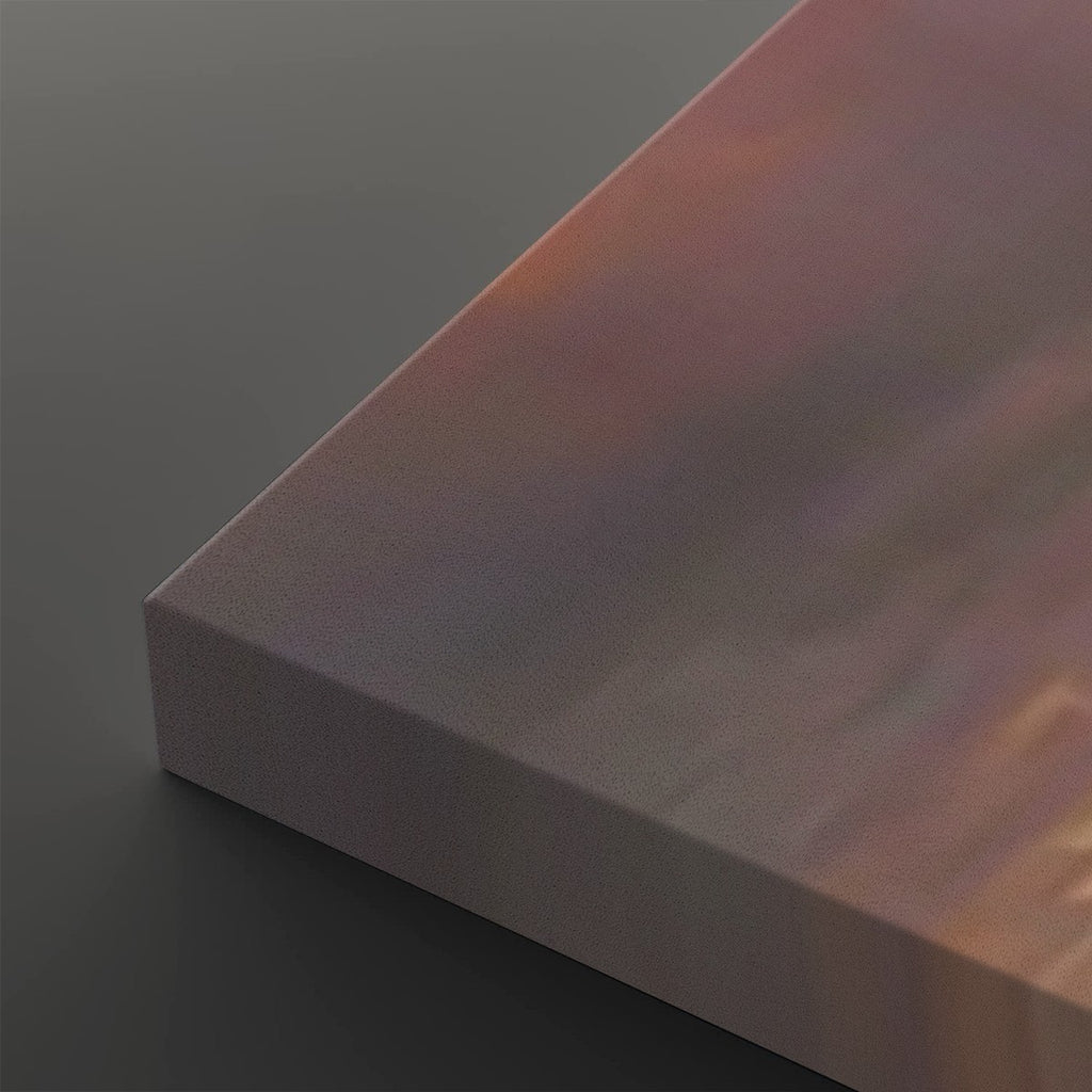 A close-up of a rectangular block or panel with a smooth, iridescent surface showing pink, purple, and blue tones, set against a dark gray background.