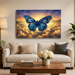 A large rectangular wall art canvas showing a vivid blue butterfly over glowing clouds at sunset, displayed above a beige sofa in a styled living room with pillows, a coffee table, lamp, and plant.
