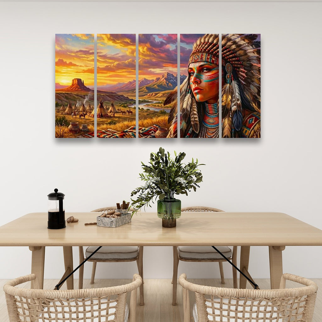 A four-panel canvas wall art set depicting a colorful landscape with a woman in a feathered headdress, displayed above a dining table in a modern room setting.