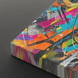 A rectangular canvas print featuring a vibrant, multicolored abstract graffiti-style design, shown at an angle against a dark gray background.