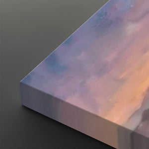 A close-up of a rectangular canvas or block with a soft  pastel lavender, pink, peach, and pale blue, shown on a dark gray background.
