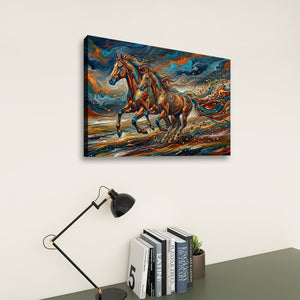 A rectangular canvas wall art print showing two galloping horses in a vivid abstract painting, displayed on a light beige wall above a desk with a black lamp and books.