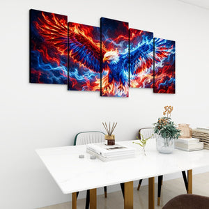 A 4-panel canvas wall art set depicting a dramatic fiery eagle with red, orange, and blue wings, displayed on a white wall above a modern dining table in a bright room.