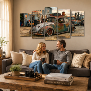 A five-panel canvas wall art set depicting a vintage rusted blue Volkswagen Beetle in a dusty garage, displayed above a couch with a couple holding mugs in a cozy living room setting.