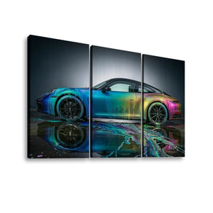 Three-panel canvas wall art showing a sports car with a vivid iridescent blue, green, yellow, and pink paint effect, displayed against a dark studio-style background with a reflective floor.