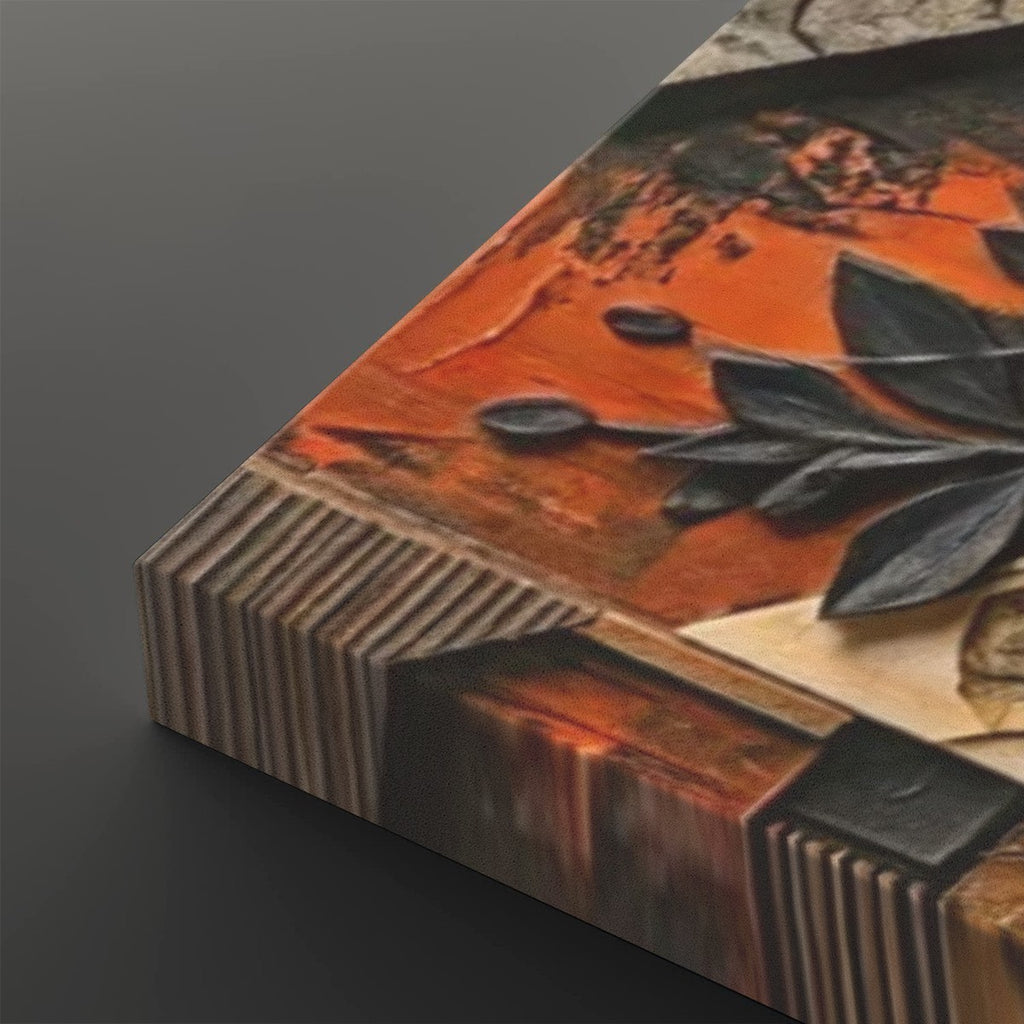 A close-up of a textured canvas or print showing an abstract design with orange, black, and brown tones, photographed at an angle against a dark gray background.