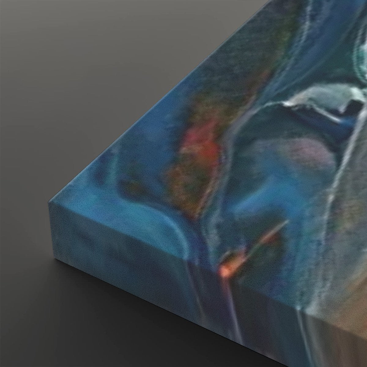 Abstract canvas wall art showing a close-up of a glossy, marbled fluid design in shades of blue, teal, gray, and subtle orange-red accents, photographed on a dark gray background.