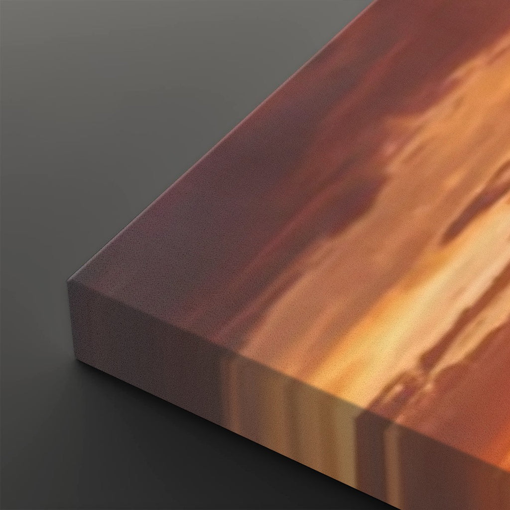 A close-up of a rectangular canvas or print showing an abstract warm-toned scene with orange, brown, and cream streaks, photographed against a dark gray background.