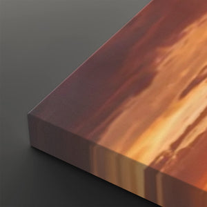 A close-up of a rectangular canvas or print showing an abstract warm-toned scene with orange, brown, and cream streaks, photographed against a dark gray background.