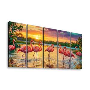 A five-panel canvas wall art set depicting a sunset scene with pink flamingos standing in reflective water, shown against a plain white background.