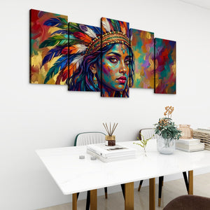 A five-panel canvas wall art set depicting a colorful portrait of a woman with vibrant feathers, displayed on a white wall above a modern dining table with books and a vase.
