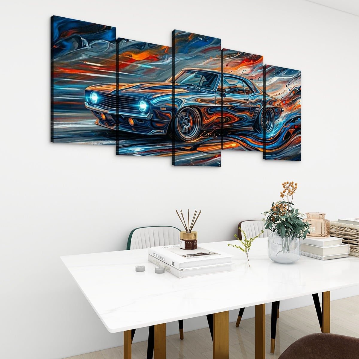 A 5-panel canvas wall art set depicting a blue 1969  Camaro sports car with vibrant orange, red, and white paint swirls, displayed on a white wall above a modern dining table with books and a vase.