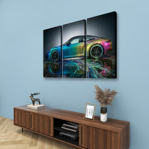 A three-panel canvas wall art set depicting a colorful iridescent sports car reflected in water, displayed on a light blue wall above a wooden console table with decorative items.