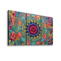 A three-panel canvas wall art set featuring a colorful abstract mandala design with a central floral motif in shades of blue, purple, pink, orange, and green on a white background.