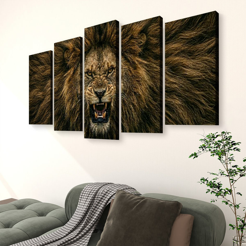 A five-panel canvas wall art set depicting a roaring lion's face and mane, displayed above a gray sofa in a living room setting.
