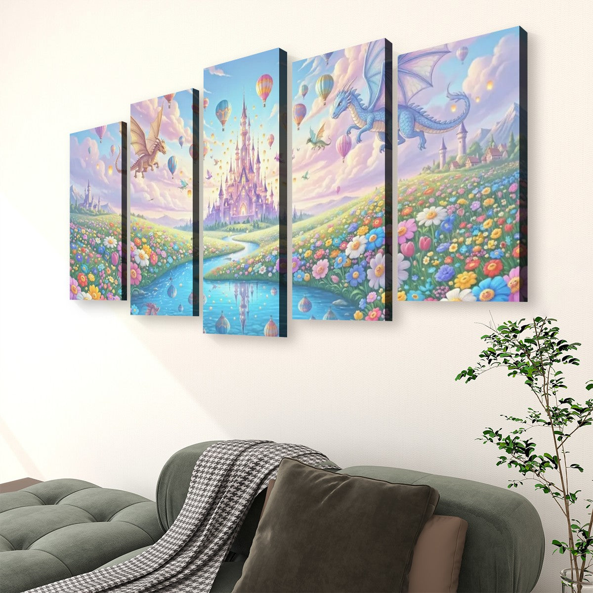 A 5-panel canvas wall art set depicting a whimsical fantasy landscape with a castle, dragons, hot air balloons, and a river, displayed on a wall above a green sofa in a living room setting.