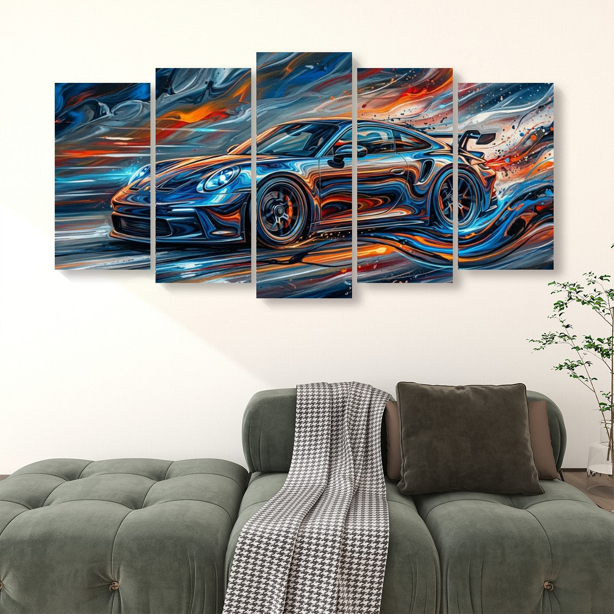 A 5-panel canvas wall art set depicting a blue sports car with vibrant orange, red, and white paint splashes, displayed on a wall above a green sofa in a living room setting.