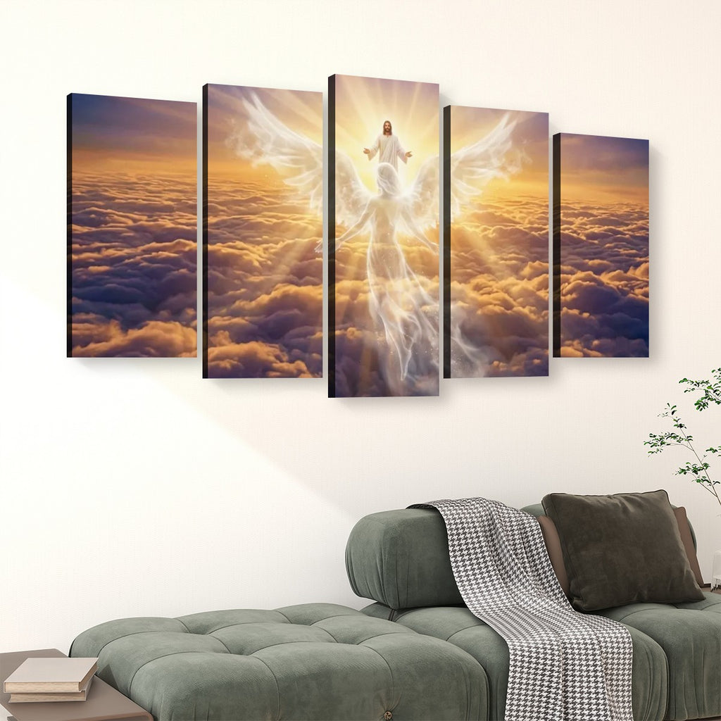 A five-panel canvas wall art set depicting a glowing angel figure above clouds, displayed on a white wall above a green sofa in a living room setting.