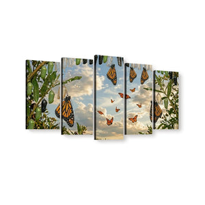 A five-panel canvas wall art set depicting monarch butterflies flying among green leaves against a cloudy sky, shown on a plain white background.