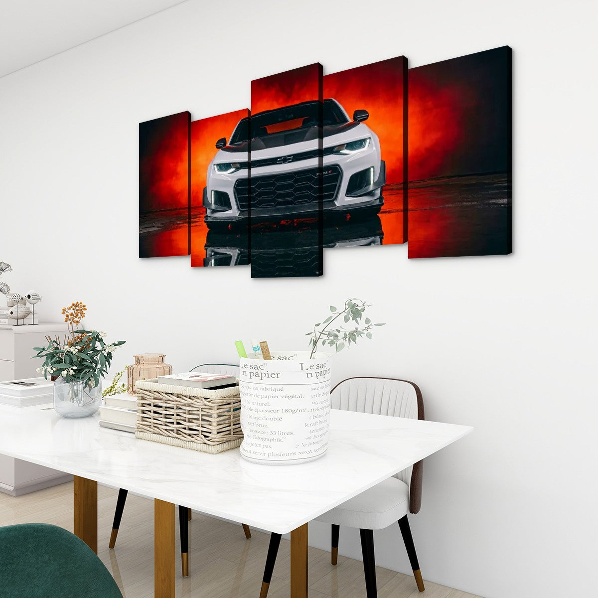 A 5-panel canvas wall art set depicting a white Camaro sports car against a dramatic red and black background, displayed on a white wall above a dining table in a modern room setting.