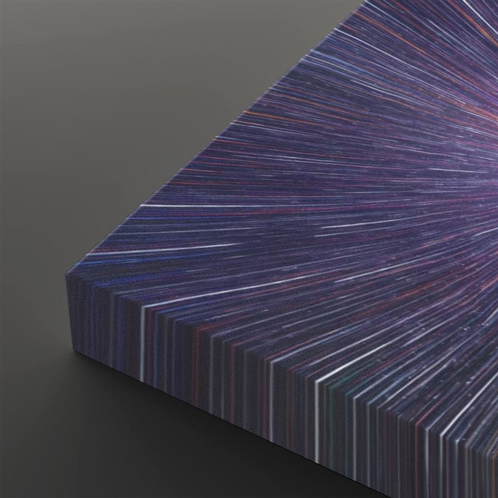 A close-up of a rectangular panel or book-like object with a radiating striped pattern in deep purple, blue, pink, and white, shown against a dark gray background.