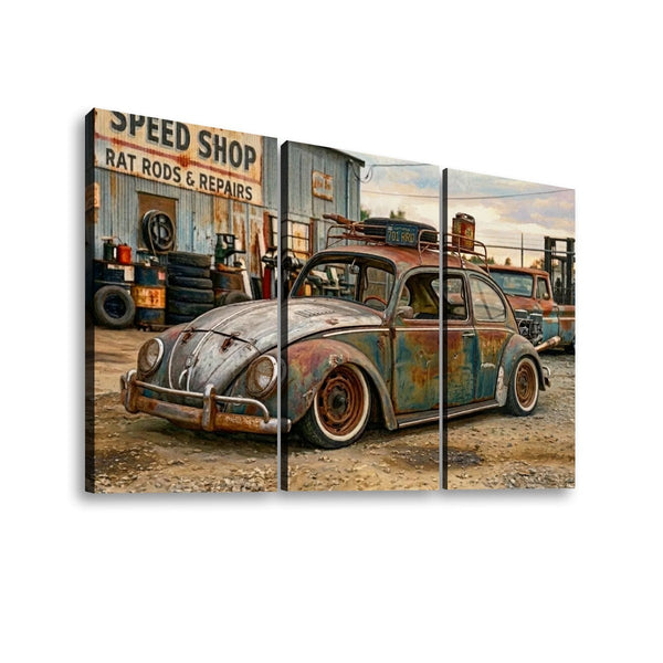 A three-panel canvas wall art print depicting a vintage rusted Beetle car parked in front of a speed shop and tire store, shown against a plain white background.