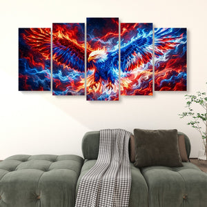 A 5-panel canvas wall art set depicting a dramatic bald eagle with wings rendered in vivid red, orange, and blue flames against a dark sky, displayed above a green sofa in a living room setting.