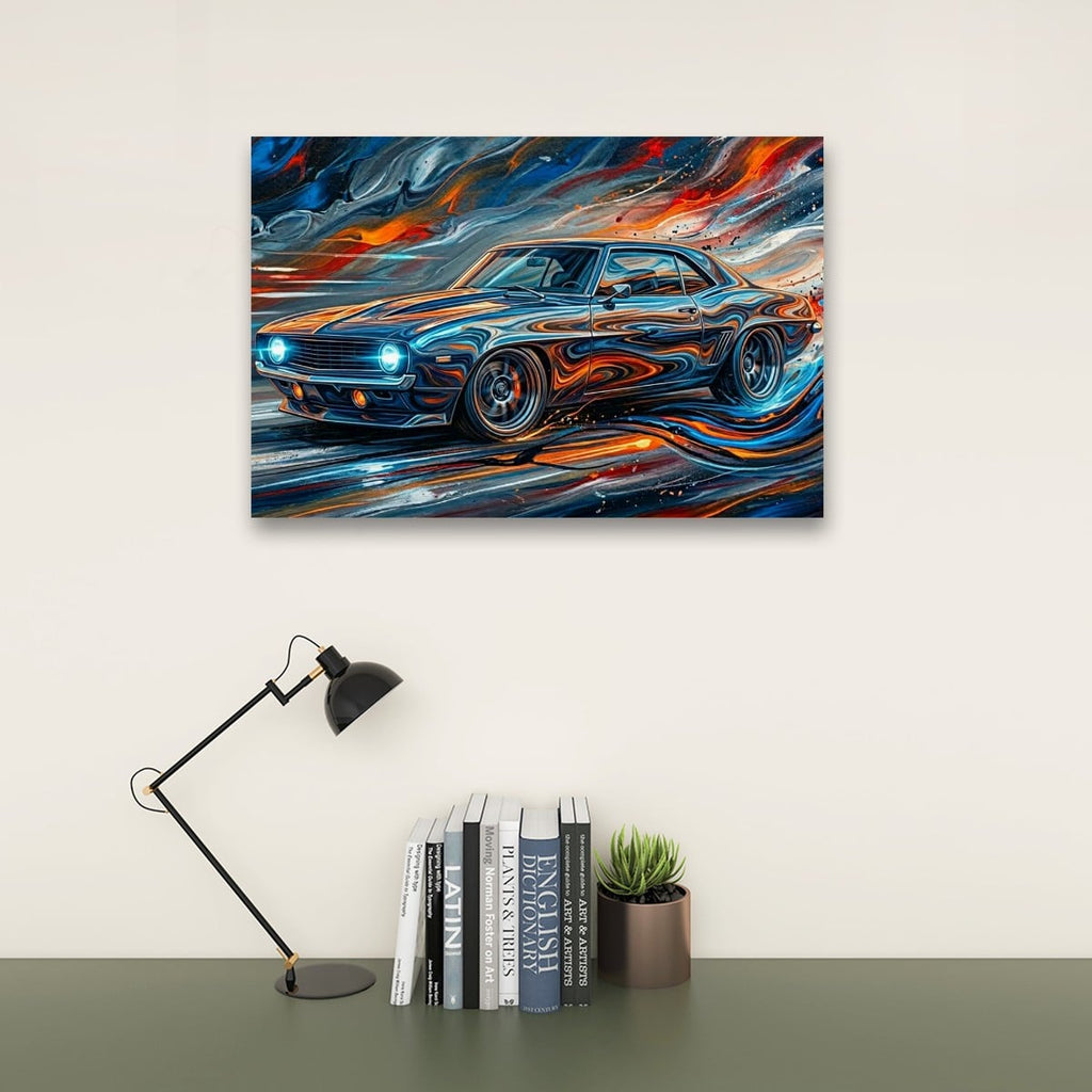 A colorful abstract canvas print of a classic 1969  Camaro muscle car, displayed on a beige wall above a desk with a black desk lamp, books, and a small succulent.
