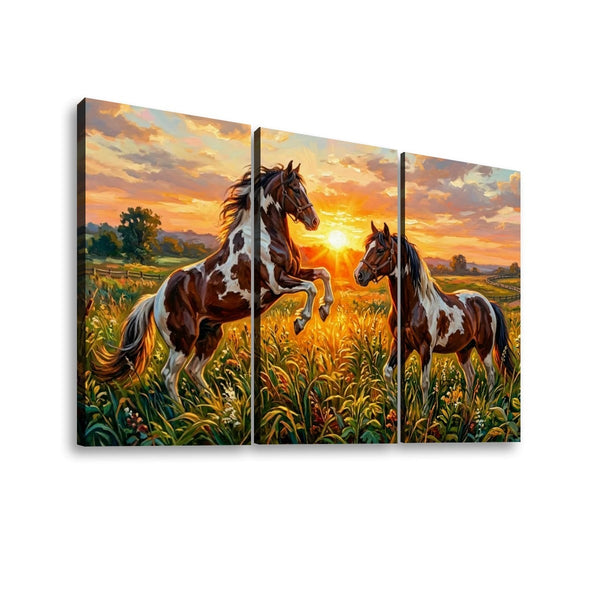 Three-panel canvas wall art showing two brown-and-white horses in a golden field at sunset, displayed against a plain white background.