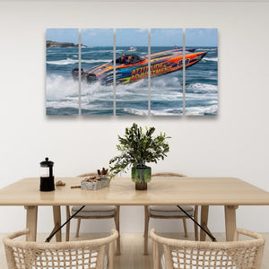 A five-panel canvas wall art print depicting a high-speed race boat on blue ocean waves, displayed above a wooden dining table with chairs in a modern, bright room.