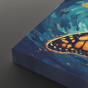 A close-up of a square canvas print showing a painted butterfly wing or insect motif in blue, teal, orange, and black, photographed on a dark gray background.