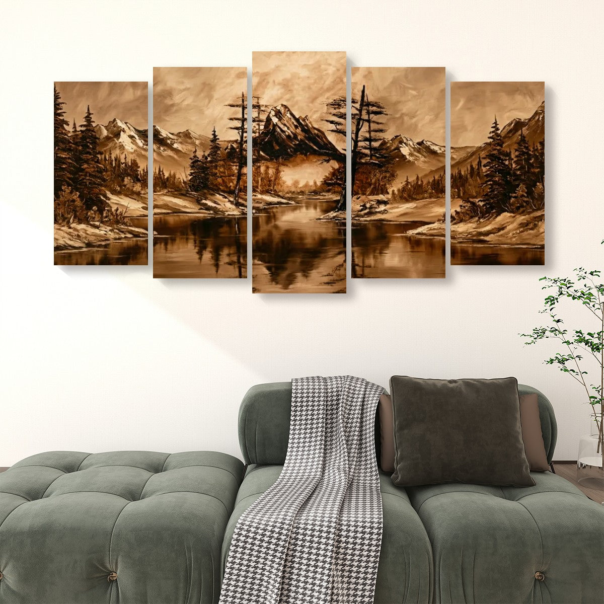 A five-panel canvas wall art set depicting a sepia-toned mountain landscape with a lake and pine trees, displayed above a green sofa in a living room setting.