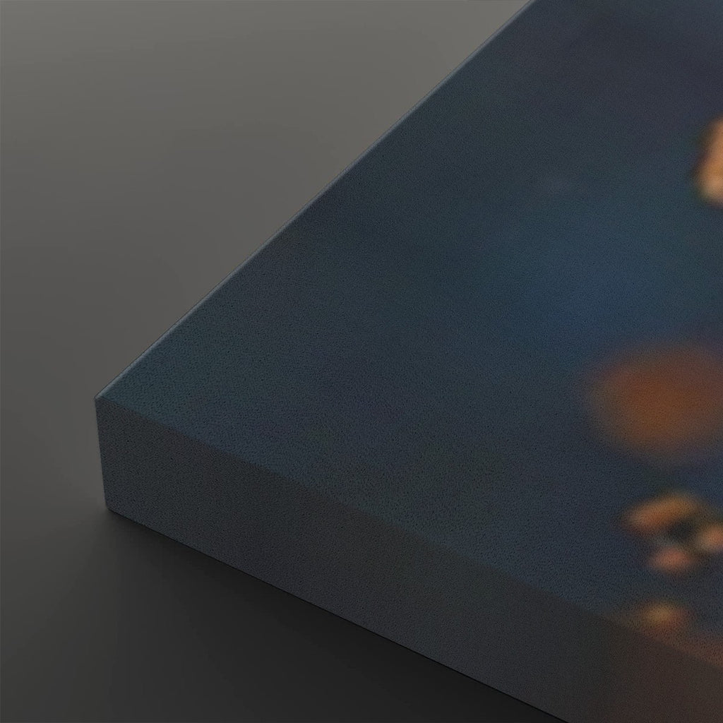 A close-up of a rectangular canvas or panel with a dark blue textured surface and soft warm light reflections, shown against a dark gray background.