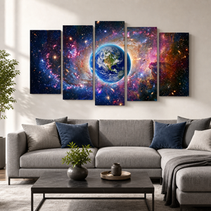 A 5-panel canvas wall art set depicting a vibrant cosmic nebula with the Earth at the center, displayed above a modern gray sectional sofa in a living room setting.