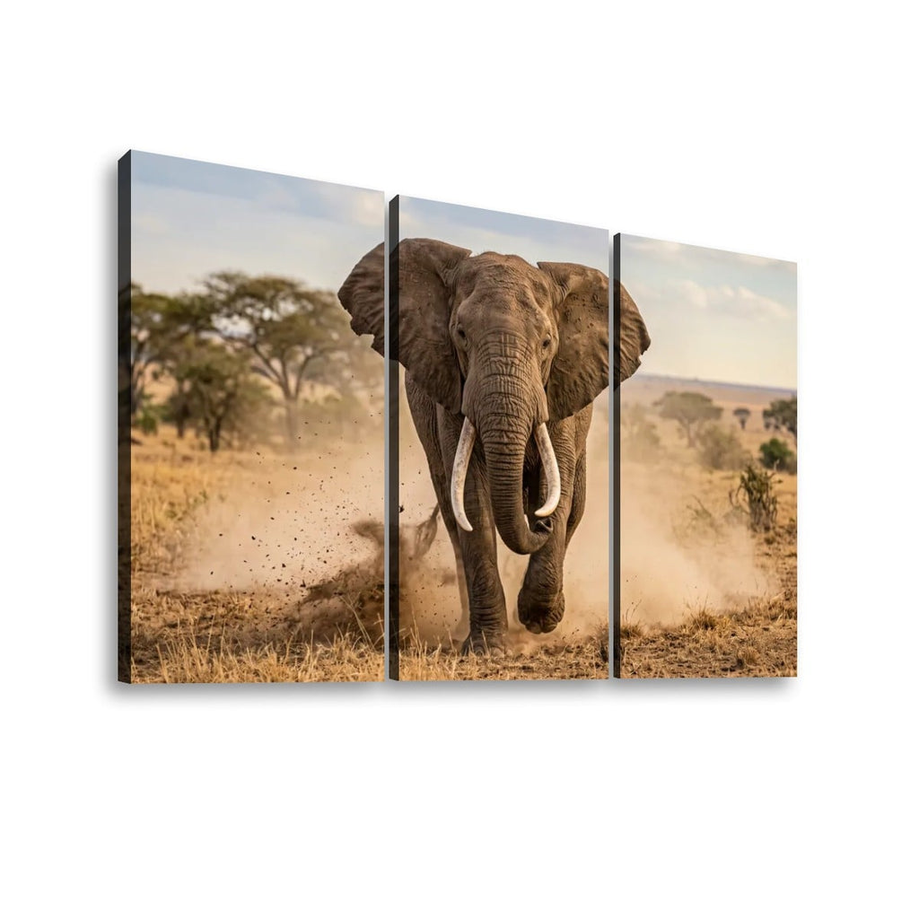 Three-panel canvas wall art showing a large elephant running through a dusty savanna landscape, displayed against a plain white background.