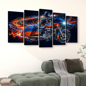 A 5-panel canvas wall art set depicting a blue and orange Road Glide type motorcycle with vibrant light trails, displayed on a beige wall above a green sofa in a living room setting.