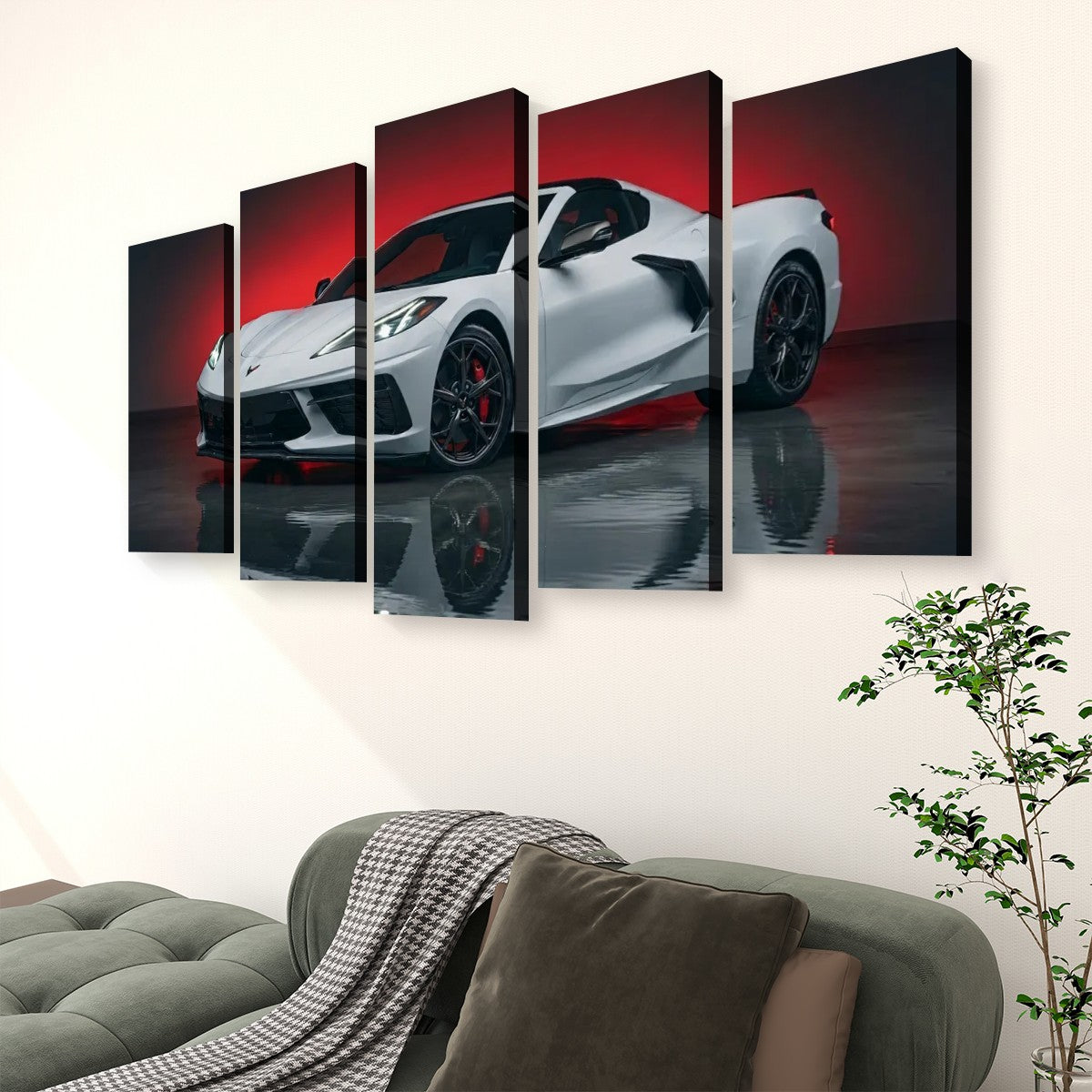 A five-panel canvas wall art set depicting a white sports car against a red and black background, displayed above a green sofa in a living room setting.